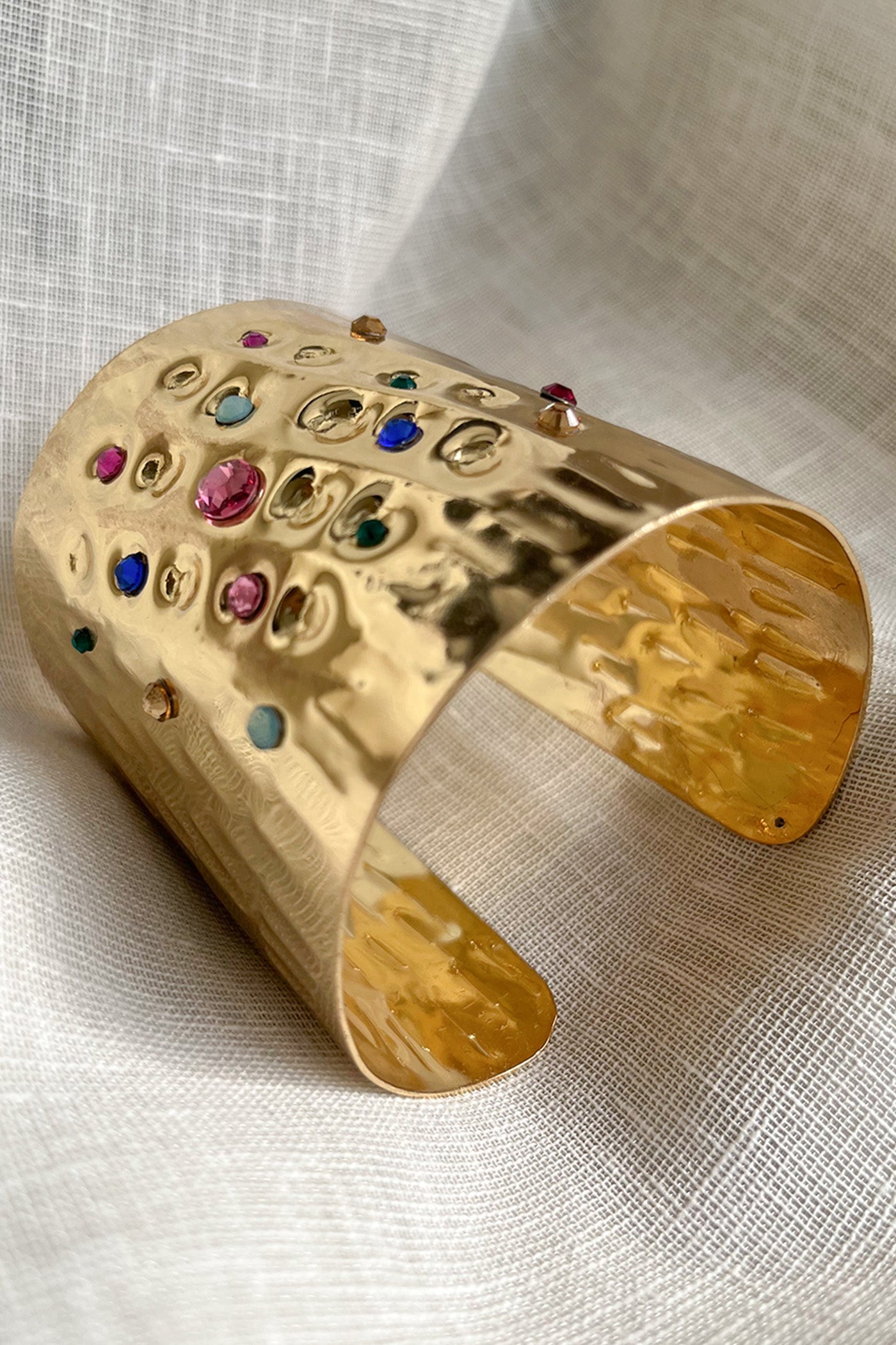 Golden multicolor studed hand cuff