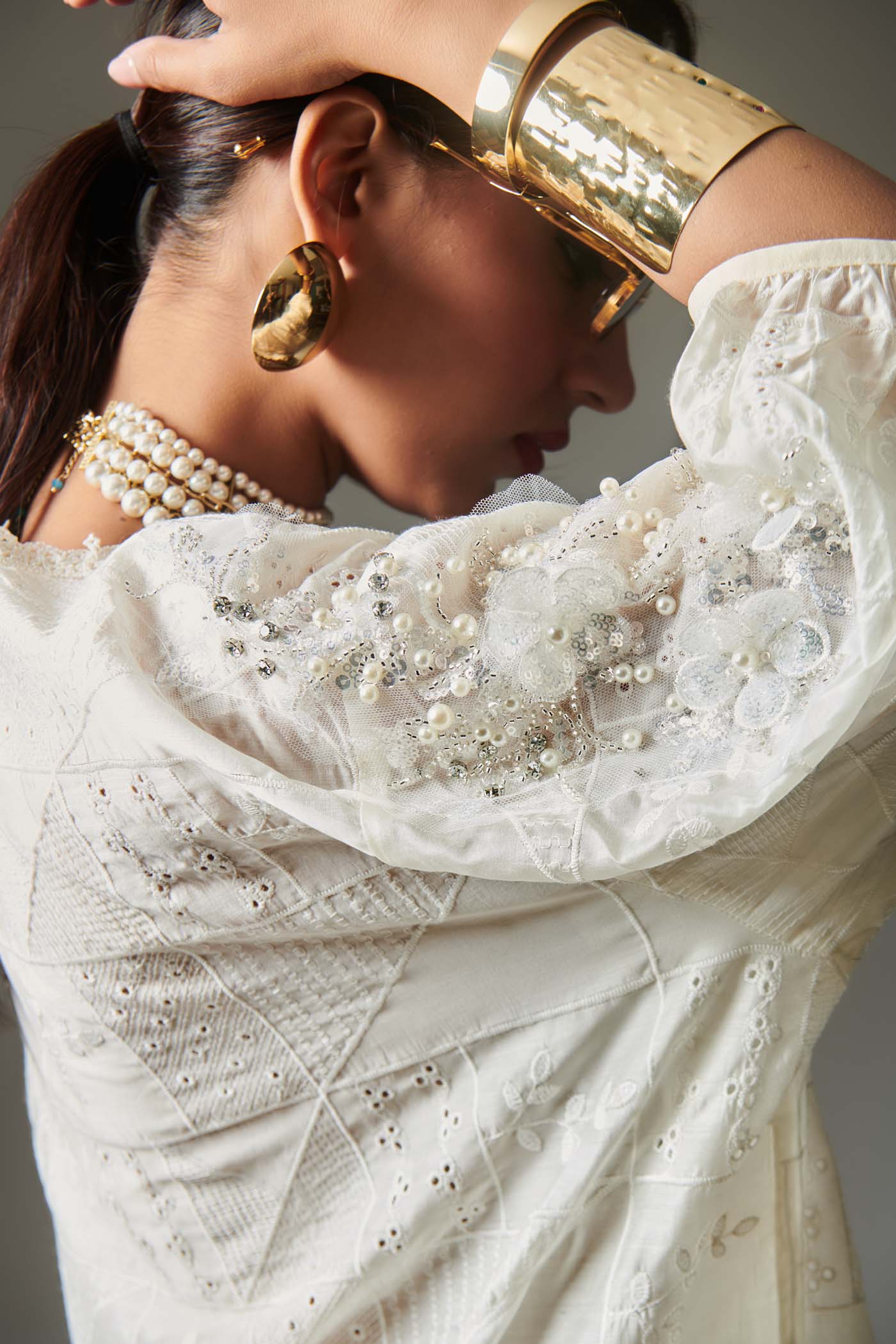 OVERSIZED EMBROIDERED SHIRT WITH INTRICATE DETAILING