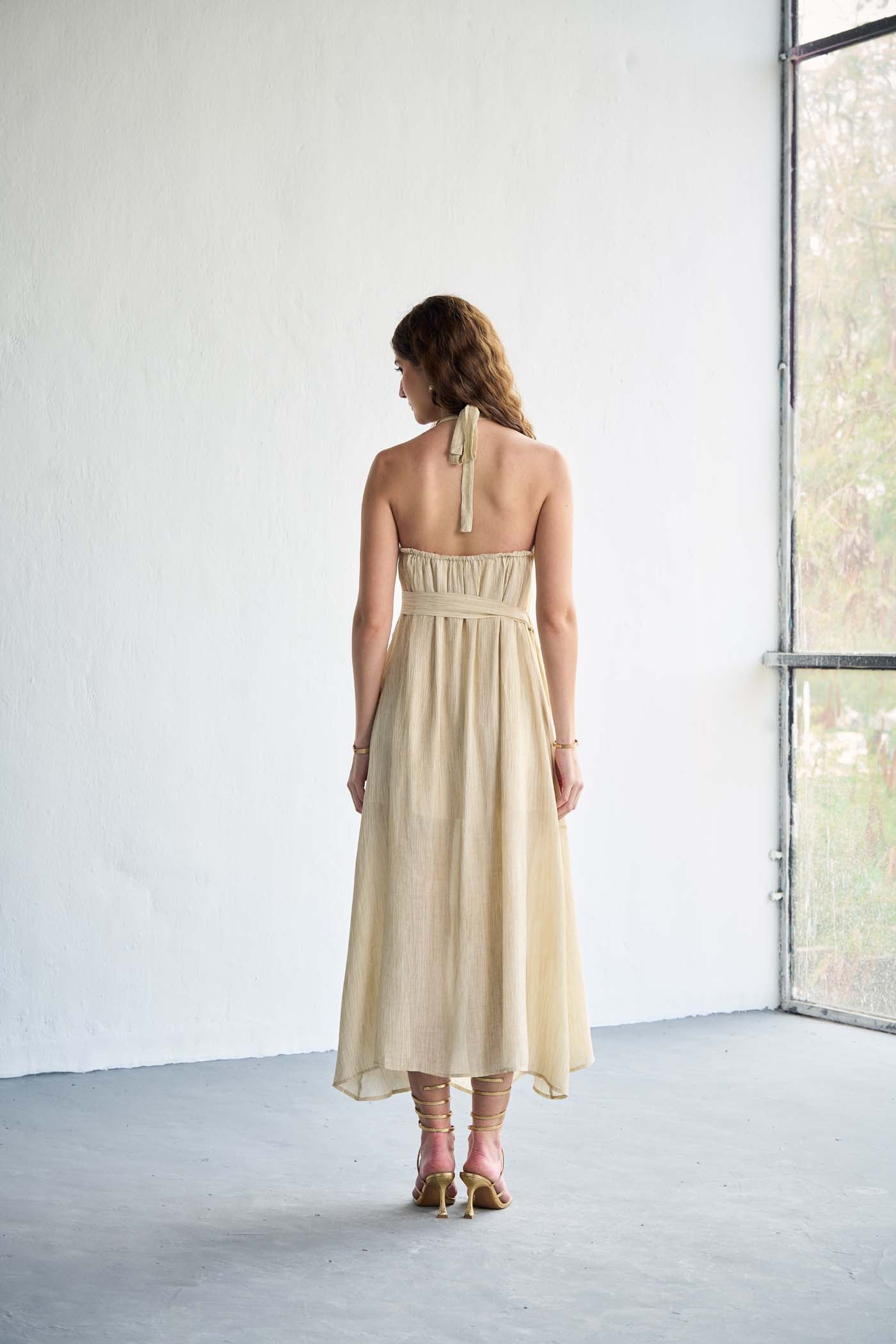 Asymmetric hemline and halter neck maxi dress